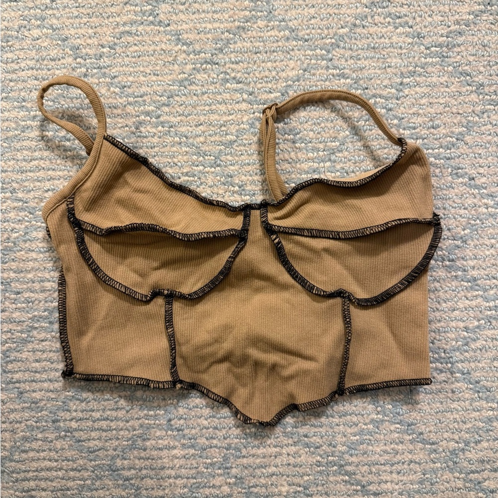 Tan and black going out top. Cropped tank. Corset.